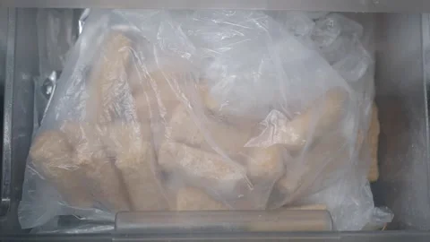 Frozen food storage in a kitchen freezer Stock Footage 344917643