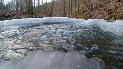 Frozen forest stream in winter 스톡 동영상 87448849