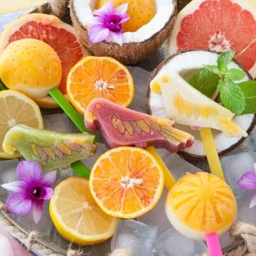 Frozen fruit popsicles Stock Photos