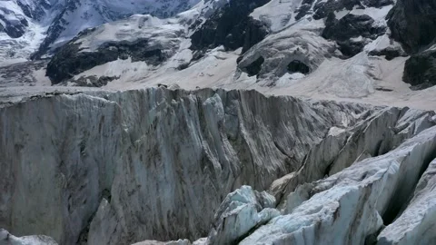 A frozen glacier surface. A torn ice texture of the icefall relief Stock Footage 169745636