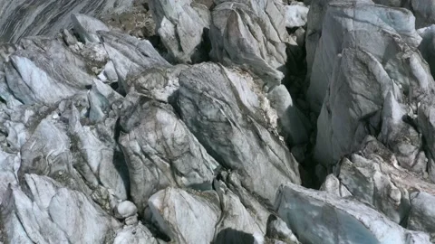 A frozen glacier surface. A torn ice texture of the icefall relief Stock Footage 169745823