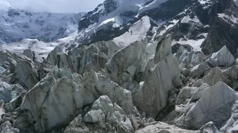 A frozen glacier surface. A torn ice texture of the icefall relief Stock Footage 169745874