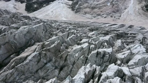 A frozen glacier surface. A torn ice texture of the icefall relief Stock Footage 169746037