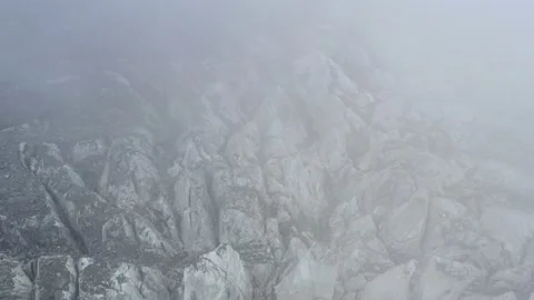 A frozen glacier surface. A torn ice texture of the icefall relief and ice lumps Stock Footage 169749128