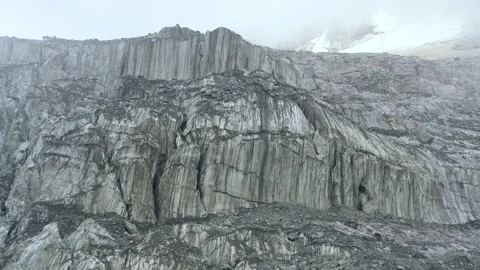 A frozen glacier surface. A torn ice texture of the icefall relief and ice lumps Stock Footage 169749525