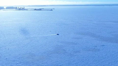 Frozen Gulf of Finland. Car on the frozen gulf. Stock Footage