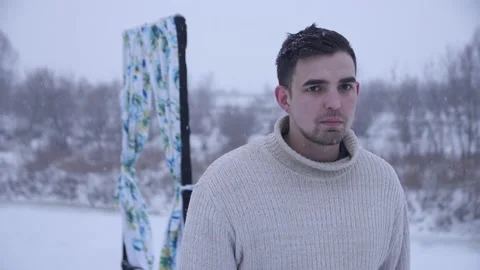 Frozen Guy Look into the Camera in Winter. Close up Stock Footage 144637414