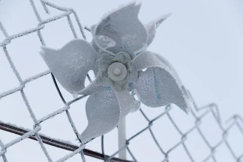 Frozen hand windmill close up in winter Stock Photos