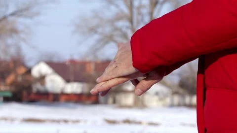 Frozen hands of a man.The concept of an abnormally cold winter in Ukraine in 202 Stock Footage 328176588