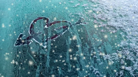 Frozen heart in window. Snowfall. Valentines day concept. Stock Footage 102204224