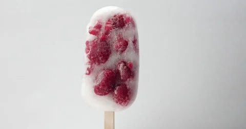Frozen ice cream with berries. Juicy ice cream handmade Stock Footage
