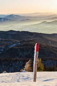 Frozen indicator on the mountain peak Stock Photos