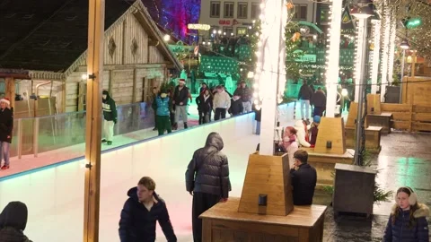 Frozen Joy Gliding, Joyful Nighttime Outdoor Ice Skating Session With Energetic Stock Footage 328049283
