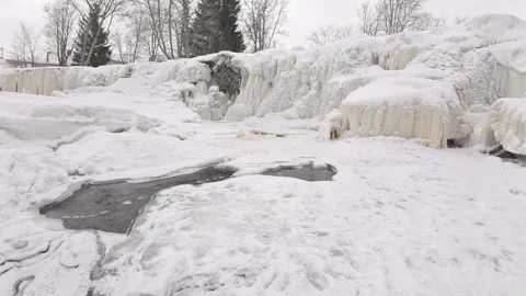 Frozen-keila-joa-waterfall-winter-wide-shot-estonia-4k.mp4 Stock Footage 330007776