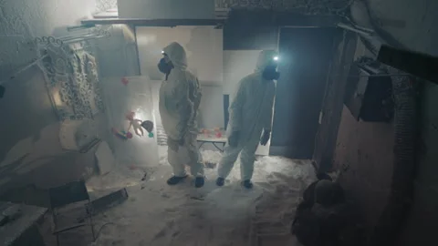 Frozen lab inspects contaminated sample. Forensic team investigates radioactive Stock Footage 346521398
