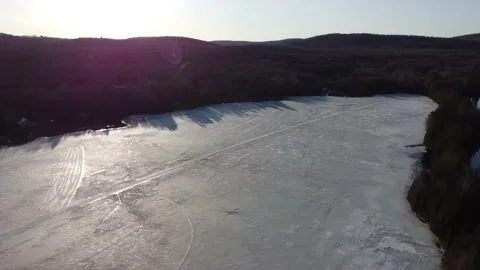 Frozen Lake and Forest Stock Footage 157887549