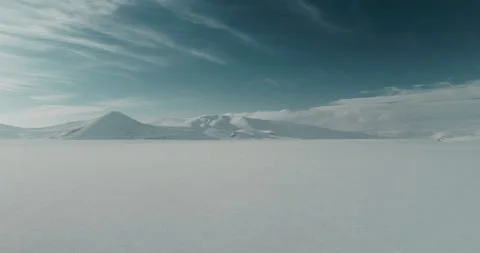 Frozen lake and Snow capped Mountains. 4K Footage in Turkey Stock Footage 144034427