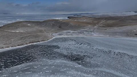 Frozen Lake Baikal with Ice Patterns in Winter 스톡 사진