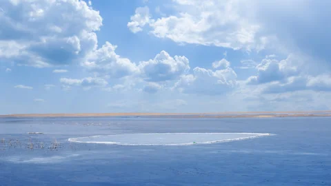 Frozen lake at the bright cold day Stock-Footage 258299290