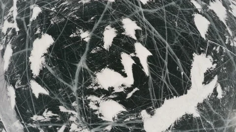Frozen lake covered with a thick layer of ice, aerial shot Stock Footage 55190975