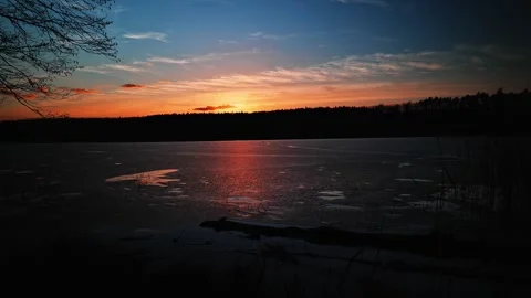Frozen Lake at Dramatic Sunset Video stock 330654984