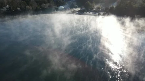 Frozen lake evaporating by drone Stock Footage 159079796