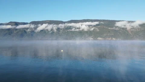 Frozen lake evaporating Stock Footage 159080033