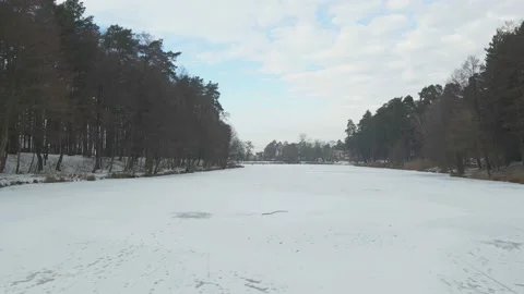 Frozen Lake In Forest Stock Footage 147449595