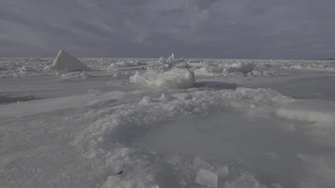 Frozen lake ice chunk winter Drone Stock Footage 82974393