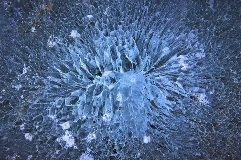 Frozen Lake Ice Pattern and Cracks Close Up Winter Texture Stock Photos