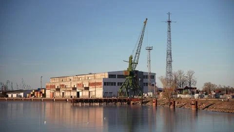 Frozen lake next to a dock and a dock crane Stock Footage 294205076
