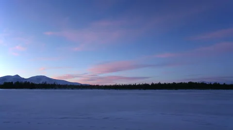 A frozen lake at nightfall Stock Footage 52384035