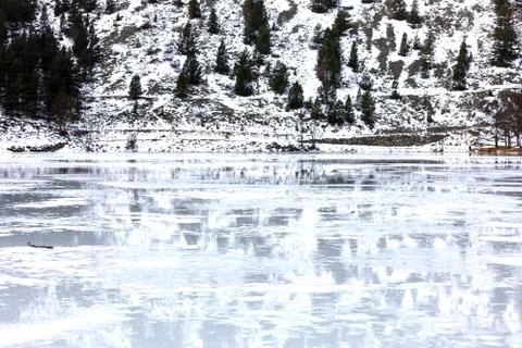 Frozen lake with reflections Stock Photos