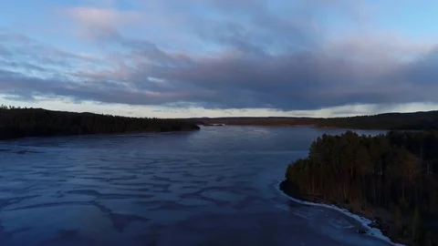 Frozen lake at sunset 動画素材 78392731