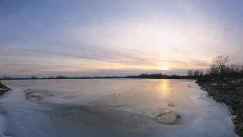 Frozen Lake At Sunset Time Lapse Stock Footage 148695069