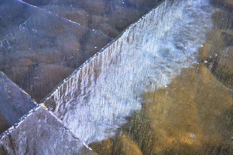 Frozen Lake Surface Close Up With Ice Textures and Subtle Winter Patterns 스톡 사진
