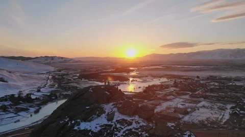 Frozen Landscape With Winding River At Sunset. Sunset Illuminates Icy Fields Stock-Footage 339205378