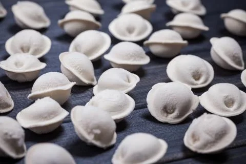 Frozen meat dumplings selective focus background Stock Photos