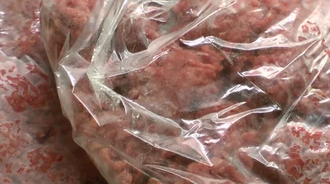 Frozen meat in plastic bag Stock Footage 49988151