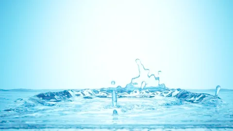 Frozen motion splash crown with waves and droplets on calm water surface Stock Illustration