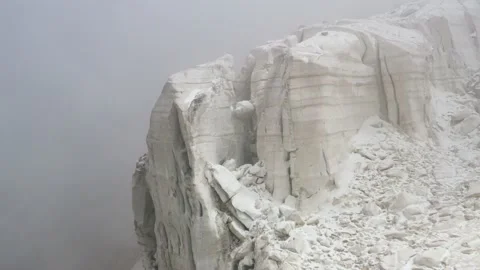 A frozen mountain glacier precipice. A torn ice texture of the glacial relief Stock Footage 169750010