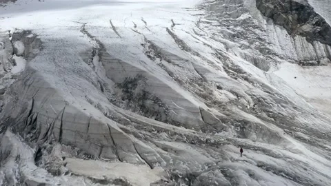 A frozen mountain glacier surface. A torn ice texture of the glacial relief Stock Footage 169749363