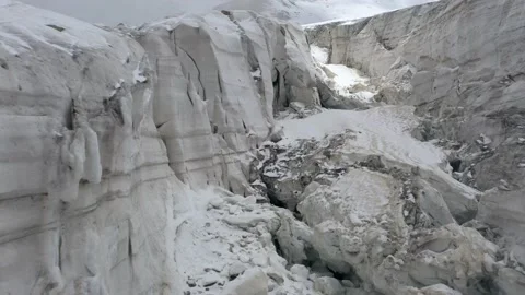 A frozen mountain glacier surface. A torn ice texture of the glacial relief Stock Footage 169749397