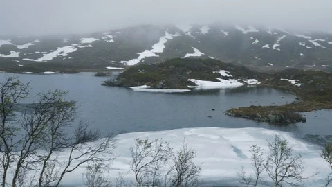Frozen mountain lake Stock Footage 100142635