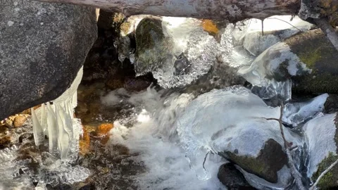 Frozen mountain stream Stock Footage 167101355