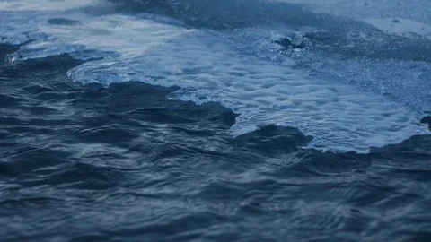 Frozen Mountain Stream. Under the ice build up running fresh water Stock Footage 102272741