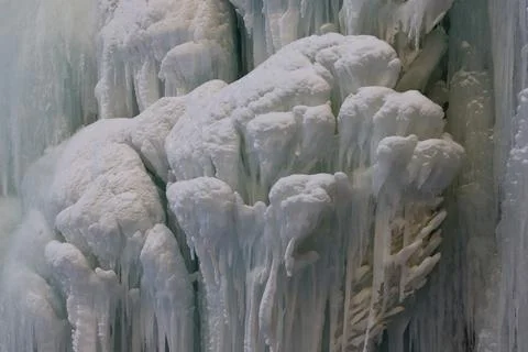 Frozen mountain waterfall close up Stock Photos
