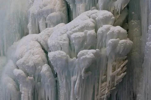 Frozen mountain waterfall close up Stock Photos