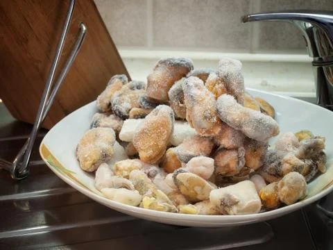 Frozen mussels Stock Photos