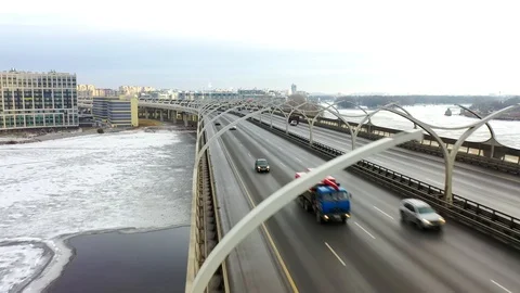 The frozen Neva River, covered with ice. City landscape in the morning. Video stock 124844083
